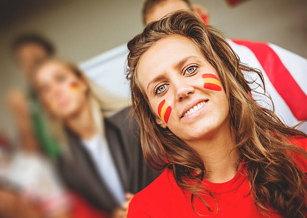 istock spanish supporter at stadium for soccer match 480694437
