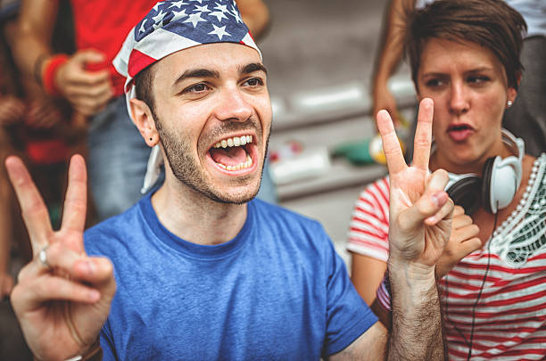 istock happiness american supporter at the stadium 480694541