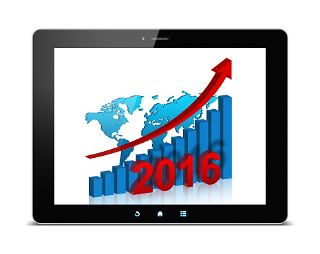 Year 2016 Growth Chart and World map in digital tablet isolated on white background