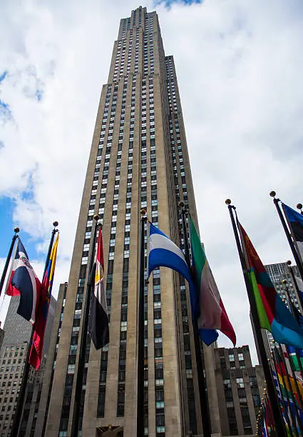 Photo of Rockefeller Center NYC Flags And Building Low Angle View