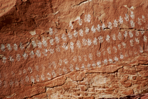 Pictographs of hands on a rock wall in southern Utah, American Southwest.