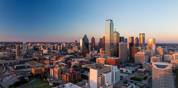 Dallas, Texas cityscape Dallas, Texas cityscape with blue sky at sunset, Texas dallas texas photos stock pictures, royalty-free photos & images