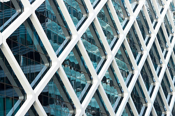 Closeup abstract modern steel and glass office building with reflection, Sydney Australia, full frame horizontal composition