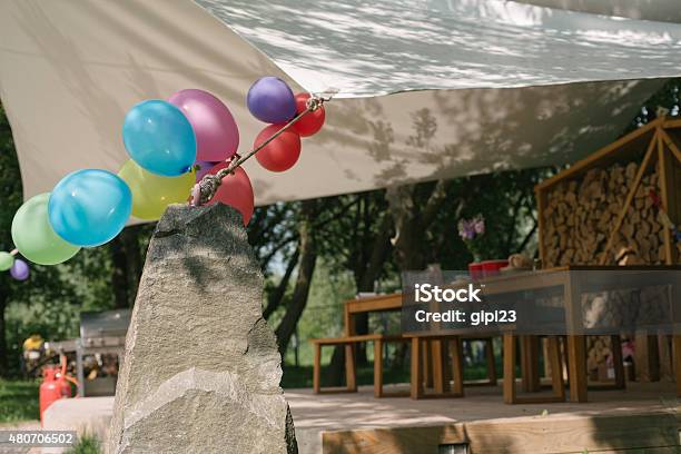 Bbq Garden Party Decorated With Balloons Of Various Colours Stock Photo - Download Image Now