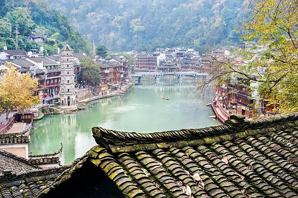 FENGHUANG, HUNAN PROVINCE, CHINA - NOV, 2014 - Fenghuang ancient town is one of the most popular ancient towns in China. It is located on the Tuojiang River and is famous for its traditional architecture.