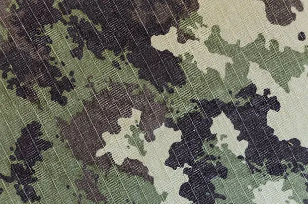 Military vegetato camouflage rip-stop fabric texture background