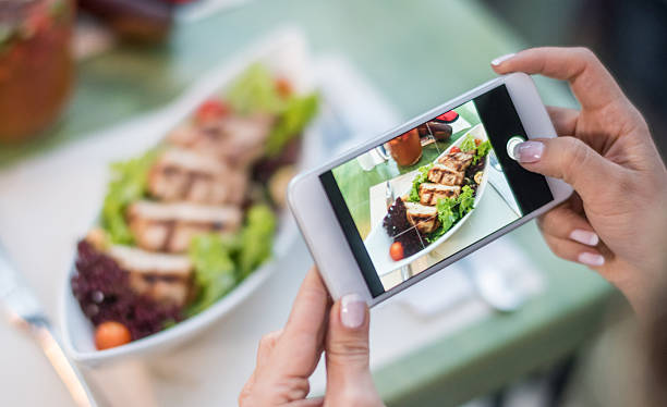 istock Woman using food app on her cell phone 480711002