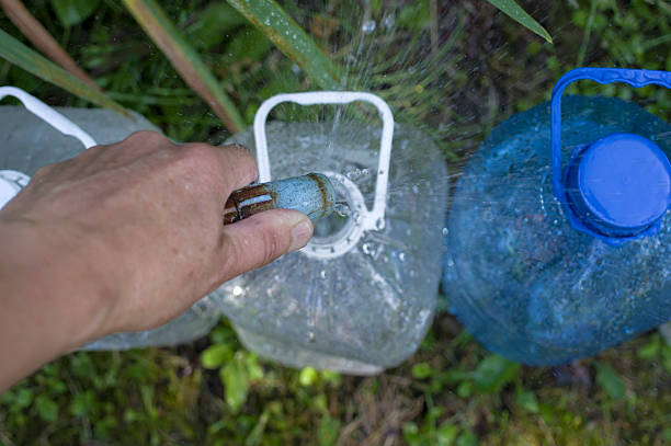 istock Hand With Garden Hose 480715288