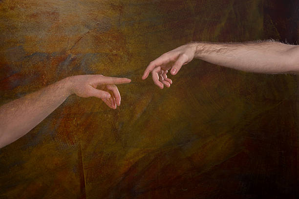 istock Two Man`s Hands in Michelandgelo Stile 480715350