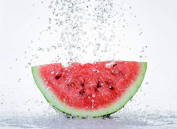 istock Red watermelon with splash of water 480715654