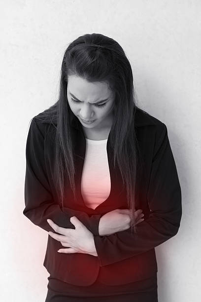 istock menstruation pain or stomach trouble, with red danger accent 480716975