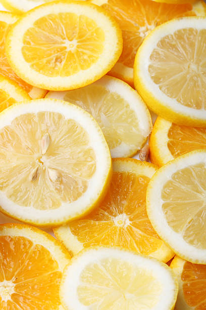 istock stack of citrus fruits slice. Oranges and lemons. 480718910