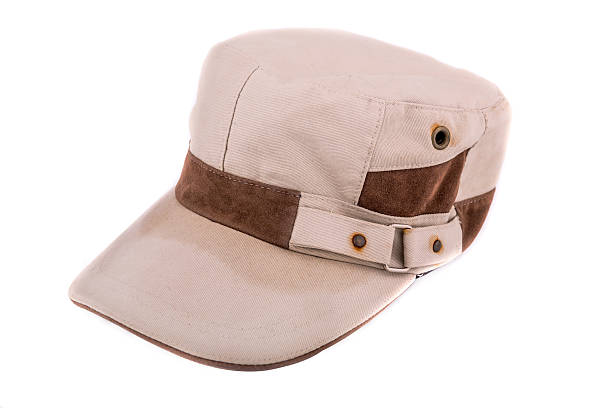 istock Dirty brown peaked cap 480720374