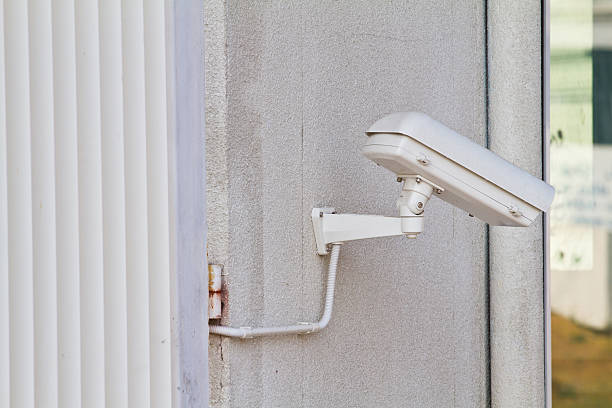 istock Security camera detects the movement of traffic. Skyscraper rooftop. 480724659
