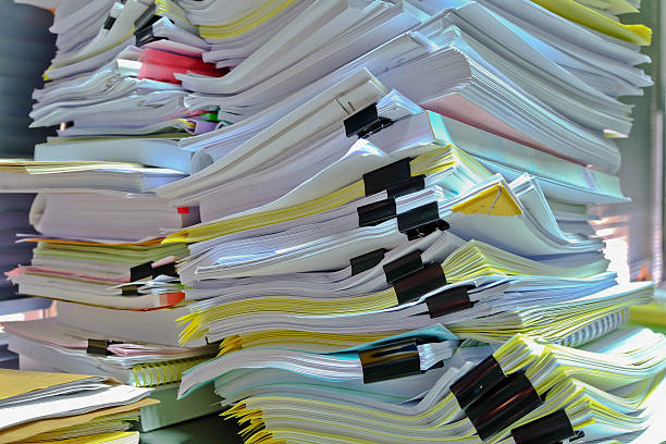 istock pile of many document in office 480727996
