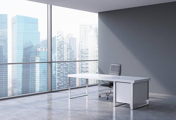 istock workplace in a modern corner panoramic office in Singapore 480728034