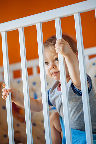istock Baby Boy In A Crib 480728188