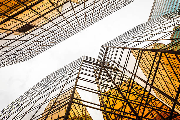 istock low angle view of modern skyscraper exterior and sky 480728666