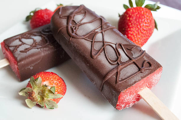 istock Close up chocolate covered strawberry ice cream popsicles 480729967