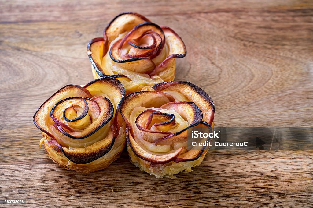 apple shaped rose apple shaped rose dessert on wooden table 2015 Stock Photo