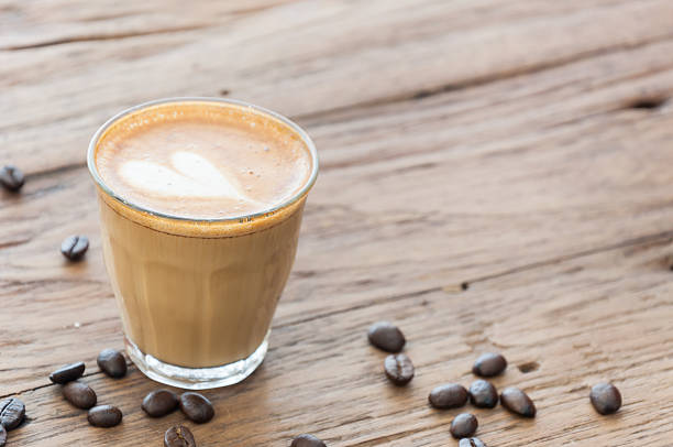 istock Hot cafe latte on wood table 480734004