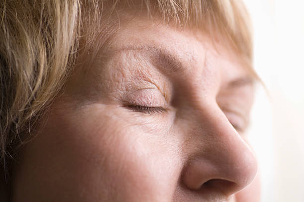 istock Senior Woman With Eyes Closed 480736497