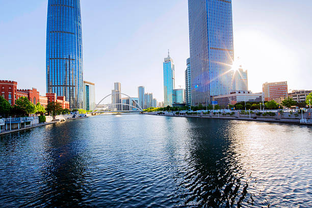istock Modern buildings and river in urban city 480736598