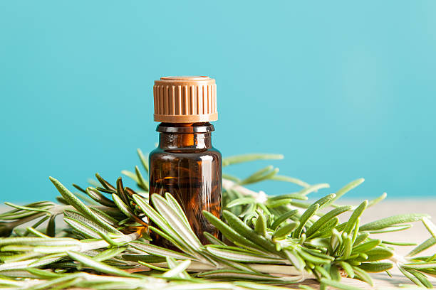 istock Bottle with aromatic oil and rosemary 480736899