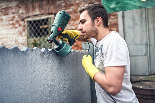 istock Professional construction worker painting walls at house renovation 480736962