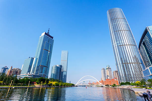 istock Modern buildings and river in urban city 480737612