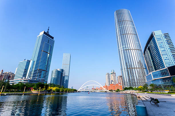 istock Modern buildings and river in urban city 480737636
