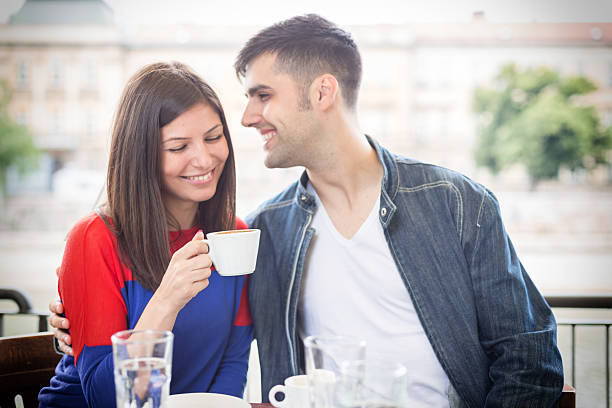 istock Couple Talking to Each Other in a Cafe at Sunset 480738756