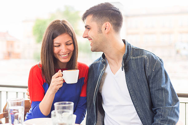 istock Couple Talking to Each Other in a Cafe at Sunset 480738858