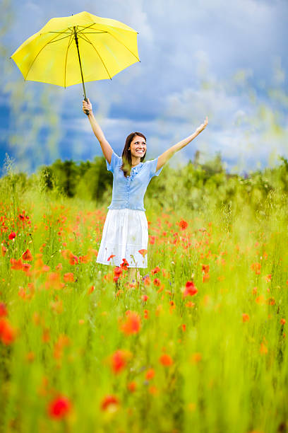 istock Woman in poppy fields 480739525