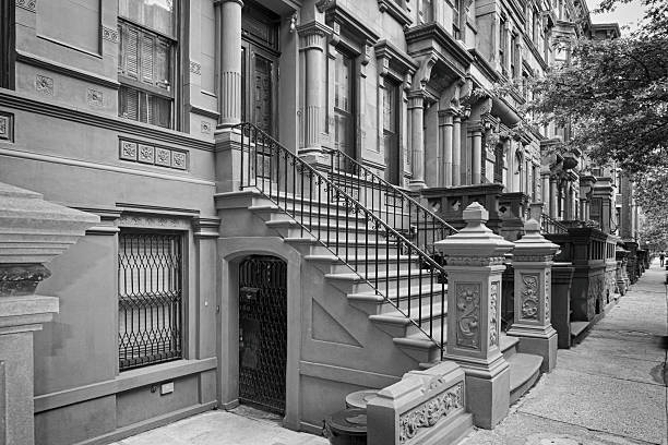 istock New York houses in Perron Harlem in b&w 480742990