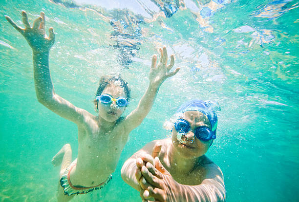istock kids sea underwater 480743458