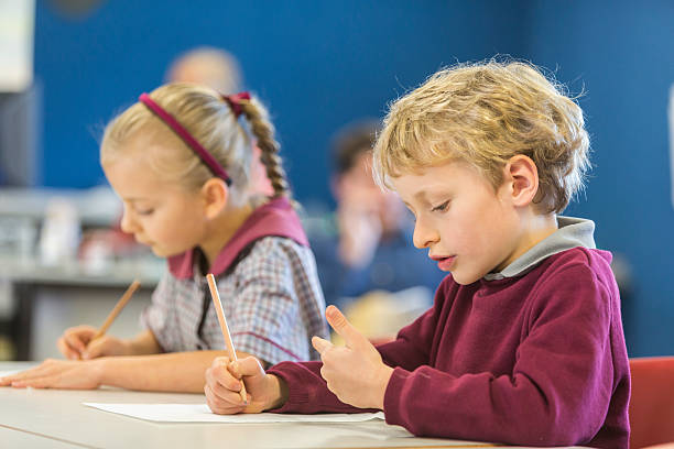 istock Happy Young School Boy Counting on His Fingers 480743750