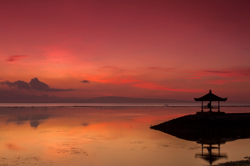 Breathtaking red sunrise (natural light) in Sanur, Bali.