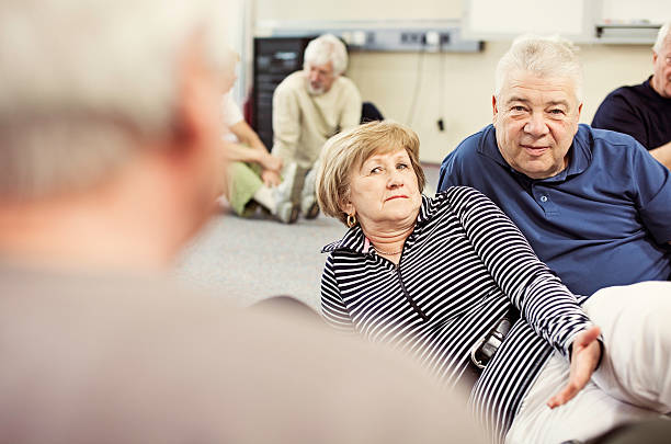 istock Seniors Having Conversation In Community Center 480744205