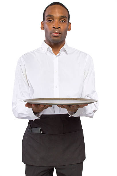 istock Young Black Server or Waiter Holding a Tray 480747023
