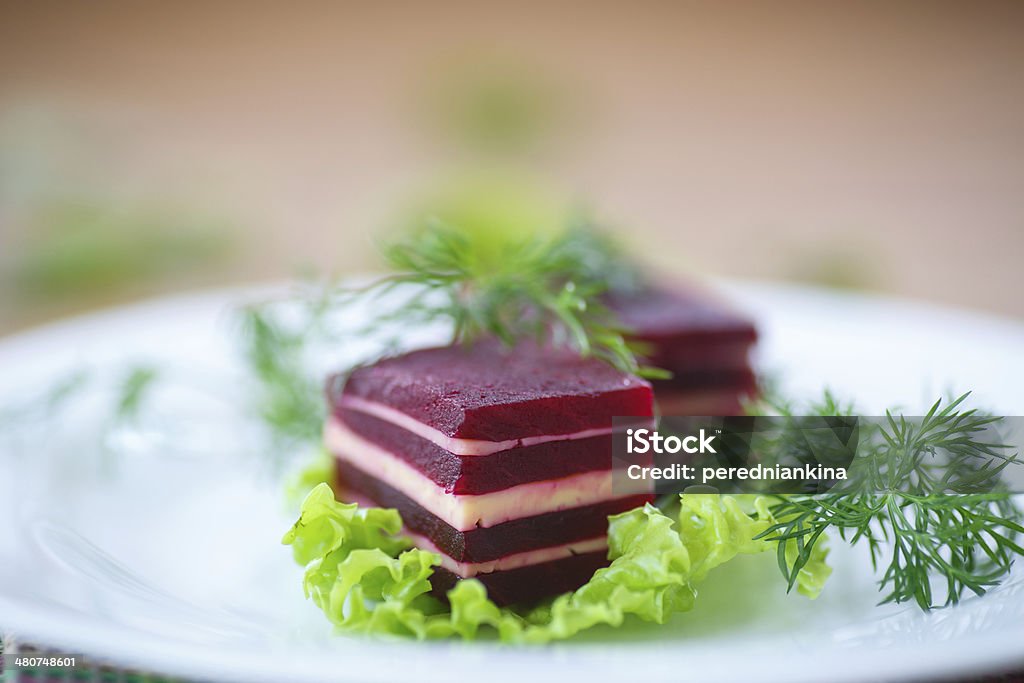 appetizer of beet and cheese on lettuce leaves appetizer of beet and cheese on lettuce leaves with dill Appetizer Stock Photo