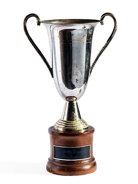 istock Silver award trophy on a wooden plinth 480750057