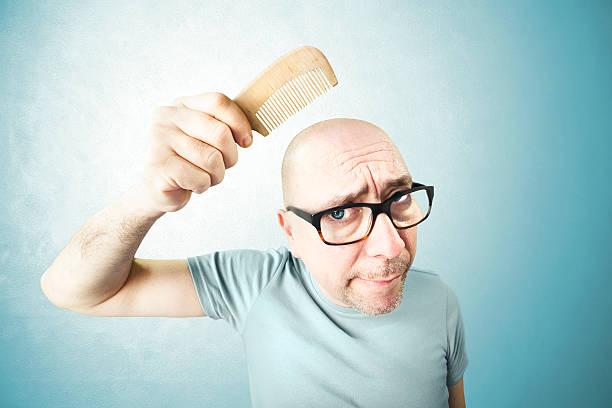 Nostalgic Man Comb His Bald Head Stock Photo - Download Image Now - Men,  Bizarre, Humor - iStock