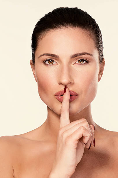 istock Beautiful sensual lips    Beauty  Dynamic women  Finger on lips 480752384