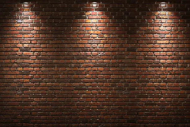 Photo of Illuminated brick wall
