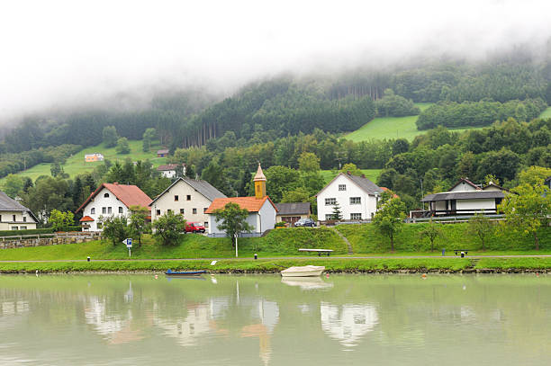 small village near grein at austria by danube river small village near grein at austria by danube river grein austria stock pictures, royalty-free photos & images