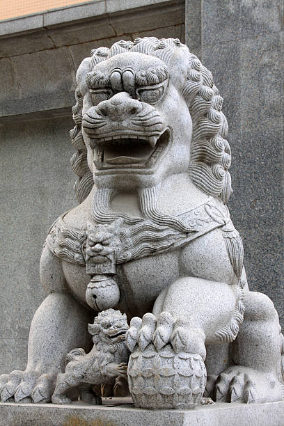 istock marble lion sculpture in a park 480758933