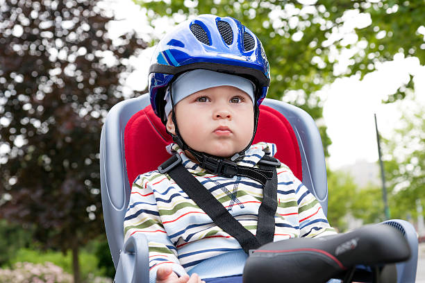 istock little boy with blue helmet on bicycle 480759409