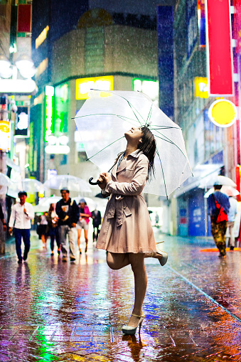 Tokyo Woman in the Rain. Shot from Istocklypse Tokyo 2015.