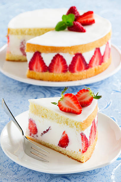 istock Sponge cake with strawberries and vanilla cream. 480760501